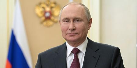 الأسد يهنئ بوتين بتنصيبه رئيسا - نايل 360